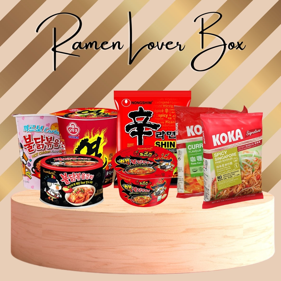 Indygood collection of various instant ramen noodle packages displayed, with the brand names and flavors visible, arranged on a wooden surface with a 'Ramen Lover Box' label at the top.