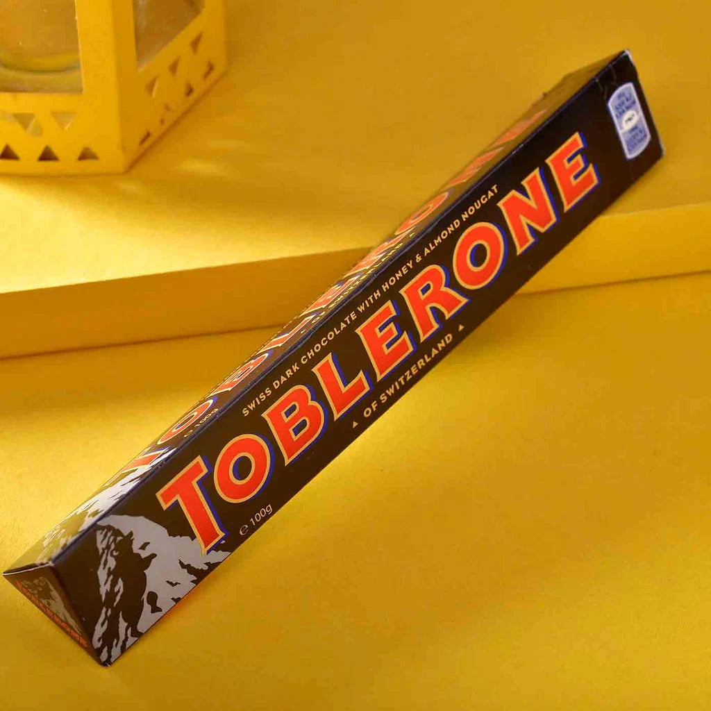 Toblerone Rakhi Hamper – Crunchy Almond Chocolate with Rakhi Roli Chawal