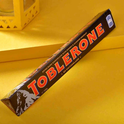 Toblerone Rakhi Hamper – Crunchy Almond Chocolate with Rakhi Roli Chawal