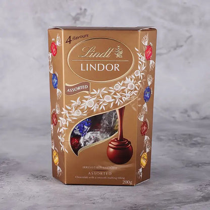 Lindt Premium Rakhi Hamper – Swiss Hazelnut, Assorted Truffles & Caramel